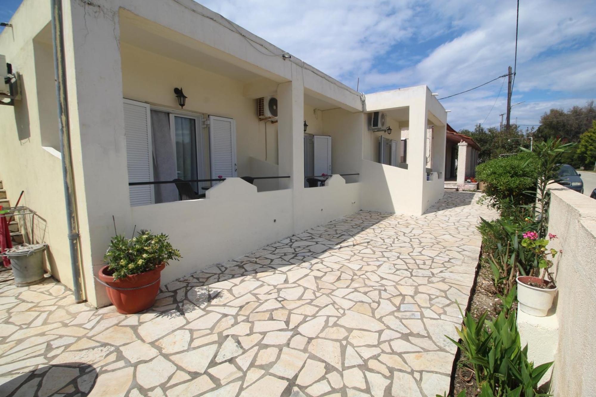 Tony'S Apartments Agios Georgios  Bagian luar foto